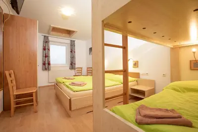 Ein Bett oder Betten in einem Zimmer der Unterkunft Chalet Central Top CC 5