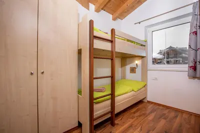 Ein Bett oder Betten in einem Zimmer der Unterkunft Chalet Central Top CC 8