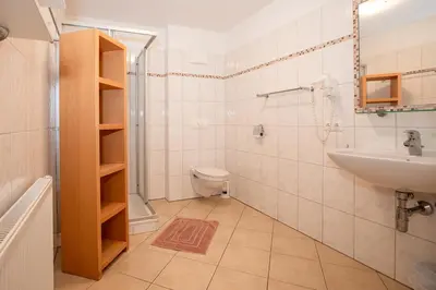 Ein Badezimmer in der Unterkunft Chalet Central Top CC 8