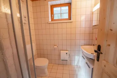 Ein Badezimmer in der Unterkunft Appartement Fürler UG