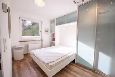 Ein Bett oder Betten in einem Zimmer der Unterkunft Appartement Bichl Top 8