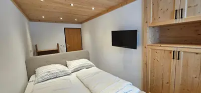 Ein Bett oder Betten in einem Zimmer der Unterkunft Appartement Dettlbauer Top 16