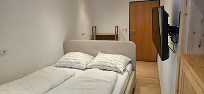 Ein Bett oder Betten in einem Zimmer der Unterkunft Appartement Dettlbauer Top 16
