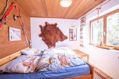 Ein Bett oder Betten in einem Zimmer der Unterkunft Höchstädter Hütte