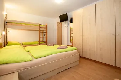 Ein Bett oder Betten in einem Zimmer der Unterkunft Chalet Central Top CC 1