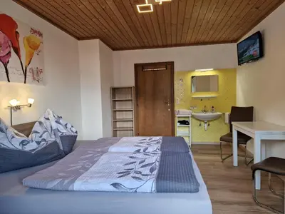 Ein Bett oder Betten in einem Zimmer der Unterkunft Haus Höllerer