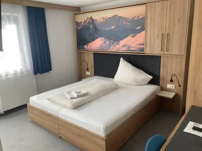 Ein Bett oder Betten in einem Zimmer der Unterkunft Pension Haus Georg