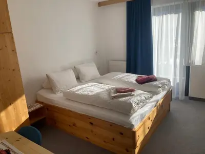 Ein Bett oder Betten in einem Zimmer der Unterkunft Pension Haus Georg