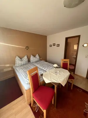 Ein Bett oder Betten in einem Zimmer der Unterkunft Pension Haus Georg