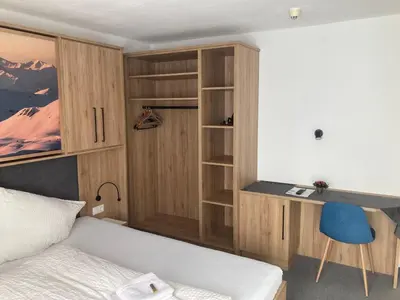 Ein Bett oder Betten in einem Zimmer der Unterkunft Pension Haus Georg