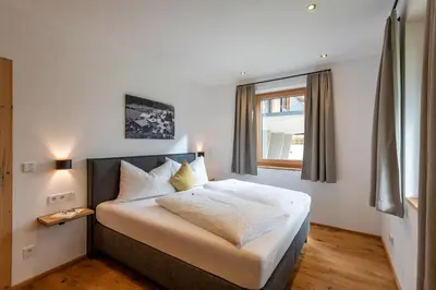 Ein Bett oder Betten in einem Zimmer der Unterkunft Schwaigermühle Apartments