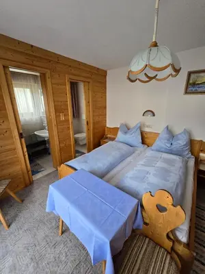 Ein Bett oder Betten in einem Zimmer der Unterkunft Haus Talblick