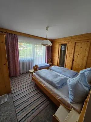 Ein Bett oder Betten in einem Zimmer der Unterkunft Haus Talblick