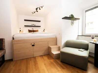Ein Bett oder Betten in einem Zimmer der Unterkunft Hoffie und Prost