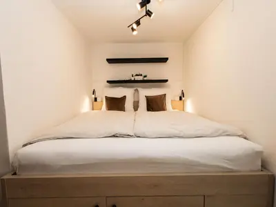 Ein Bett oder Betten in einem Zimmer der Unterkunft Hoffie