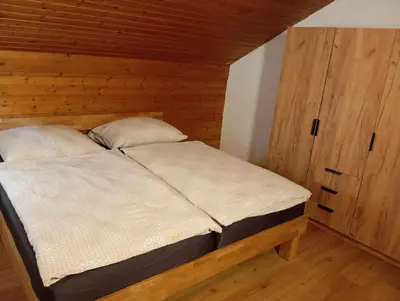 Ein Bett oder Betten in einem Zimmer der Unterkunft Ferienwohnung Maier