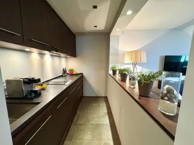 Küche/Küchenzeile in der Unterkunft KITZ DELUXE SUITE 1 & 2 im Zentrum mit eigenem SPA & PARKEN by belle-stay