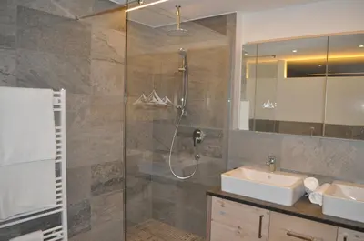 Ein Badezimmer in der Unterkunft Alpen Chalet Dorfwies