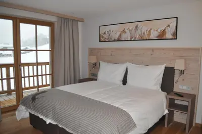 Ein Bett oder Betten in einem Zimmer der Unterkunft Alpen Chalet Dorfwies