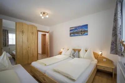 Ein Bett oder Betten in einem Zimmer der Unterkunft Appartementhaus Glashütte