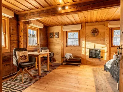 Ein Sitzbereich in der Unterkunft Historic farmhouse 200 years old meets new