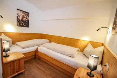 Ein Bett oder Betten in einem Zimmer der Unterkunft Ferienwohnung Königsleiten 121b - Top 4