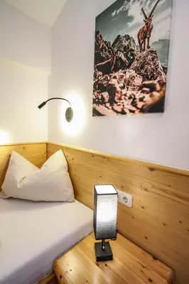 Ein Bett oder Betten in einem Zimmer der Unterkunft Ferienwohnung Königsleiten 121b - Top 4