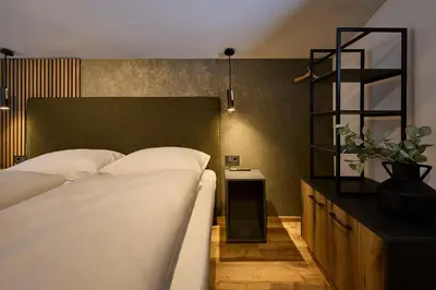 Ein Bett oder Betten in einem Zimmer der Unterkunft MiLa Apartments