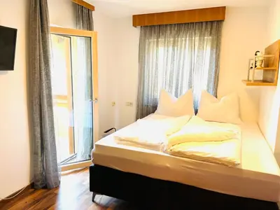 Ein Bett oder Betten in einem Zimmer der Unterkunft Maisonette Adelrun