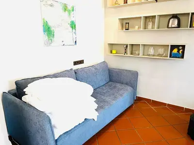 Ein Sitzbereich in der Unterkunft Maisonette Adelrun