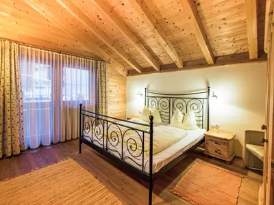 Ein Bett oder Betten in einem Zimmer der Unterkunft Holiday Home Alpenglück by Interhome