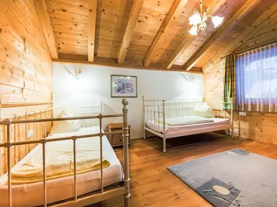 Ein Bett oder Betten in einem Zimmer der Unterkunft Holiday Home Alpenglück by Interhome