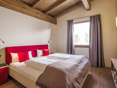 Ein Bett oder Betten in einem Zimmer der Unterkunft Apartment Resort Tirol Wildschönau 3 by Interhome