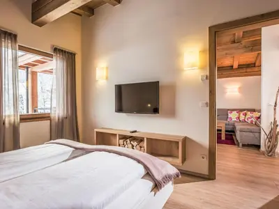 Ein Bett oder Betten in einem Zimmer der Unterkunft Apartment Resort Tirol Wildschönau 3 by Interhome