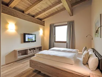 Ein Bett oder Betten in einem Zimmer der Unterkunft Apartment Resort Tirol Brixen 1 by Interhome
