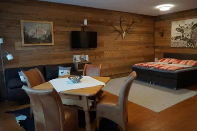 Ein Bett oder Betten in einem Zimmer der Unterkunft Wohlfühlstudio Bergblick in Walchsee