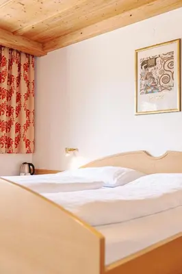 Ein Bett oder Betten in einem Zimmer der Unterkunft Pension Schlossberg