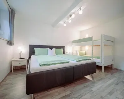 Ein Bett oder Betten in einem Zimmer der Unterkunft Apart Martina