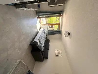 Ein Sitzbereich in der Unterkunft Sunseit Apartment