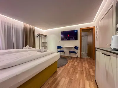 Ein Bett oder Betten in einem Zimmer der Unterkunft Luna Studios Zillertal