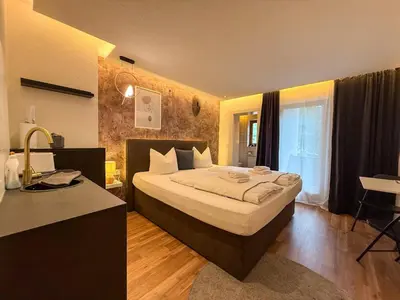 Ein Bett oder Betten in einem Zimmer der Unterkunft Luna Studios Zillertal