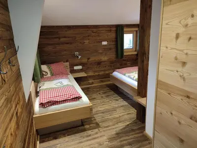 Ein Bett oder Betten in einem Zimmer der Unterkunft Ferienhaus Strauss