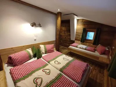 Ein Bett oder Betten in einem Zimmer der Unterkunft Ferienhaus Strauss