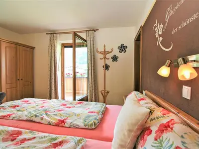 Ein Bett oder Betten in einem Zimmer der Unterkunft Apartment Paradiso by Interhome