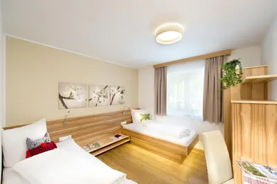 Ein Bett oder Betten in einem Zimmer der Unterkunft Apartment Dorfjuwel