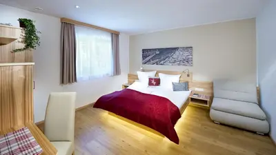 Ein Bett oder Betten in einem Zimmer der Unterkunft Apartment Dorfjuwel