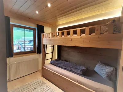 Ein Bett oder Betten in einem Zimmer der Unterkunft Pension Sonderbichlhof