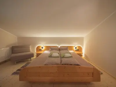 Ein Bett oder Betten in einem Zimmer der Unterkunft Pension Sonderbichlhof