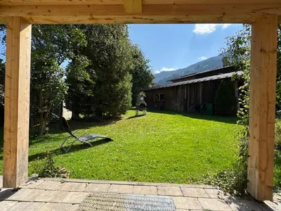 Ein Garten an der Unterkunft ALPIN CHARME APARTMENTS Tonis cozy Boutique Apartment