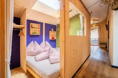 Ein Bett oder Betten in einem Zimmer der Unterkunft klein und fein wohnen OM